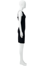 Load image into Gallery viewer, A black sleeveless mini dress from Ann Demuelmeester fw07 collection displayed on a white mannequin in a side profile view against a plain white background.
