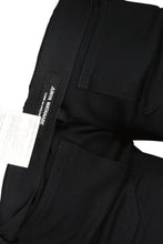 Load image into Gallery viewer, JUNYA WATANABE FW15 STUDDED SKINNY TROUSERS
